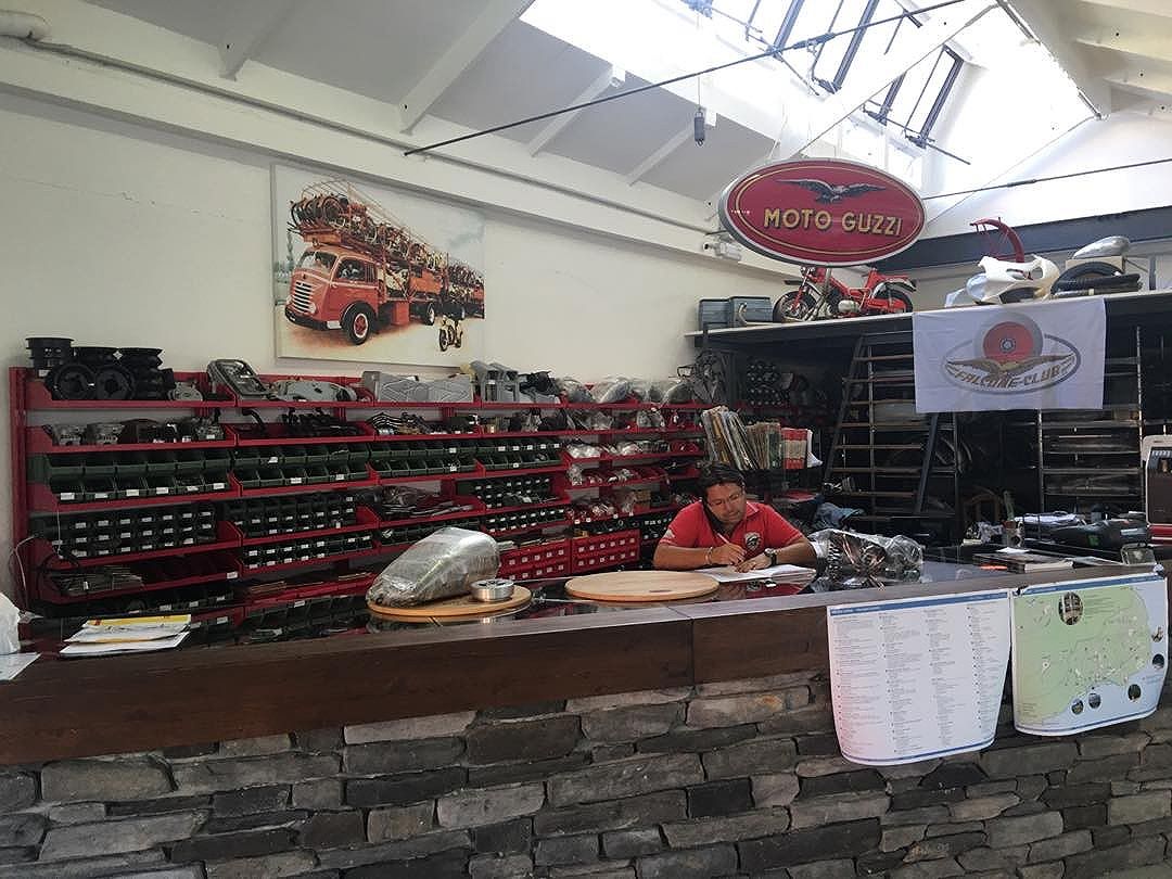 My favourite shop in Italy. Talk about a kid in a lolly shop. @guzziretro #motoguzzi #guzziraceraus